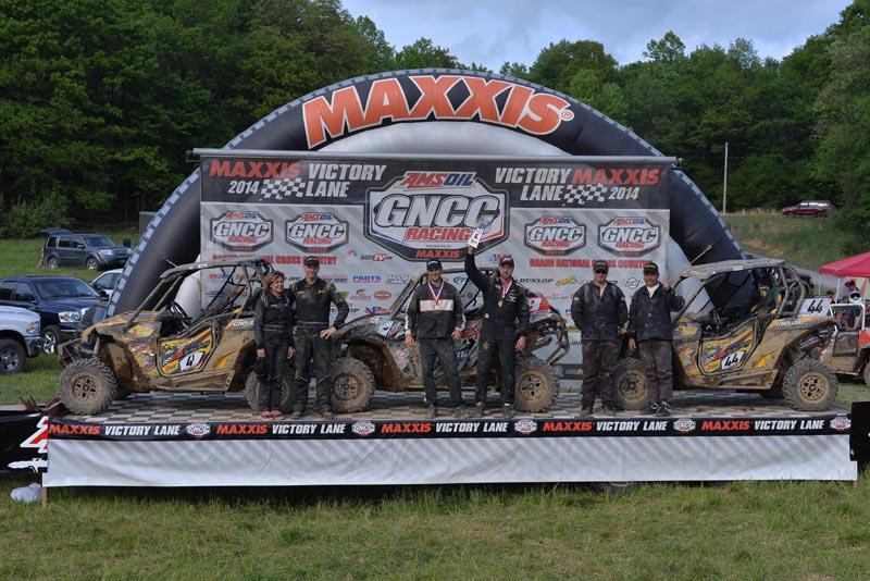 The Mountaineer Run GNCC XC1 Modified class and side-by-side overall podium was comprised of Can-Am Maverick 1000R racers, including runner-up Tim Farr (co-pilot Julie Farr), winner Kyle Chaney (co-pilot Chris Bithell), and third-place finisher Larry Hendershot Jr. (co-pilot Larry Sr.)