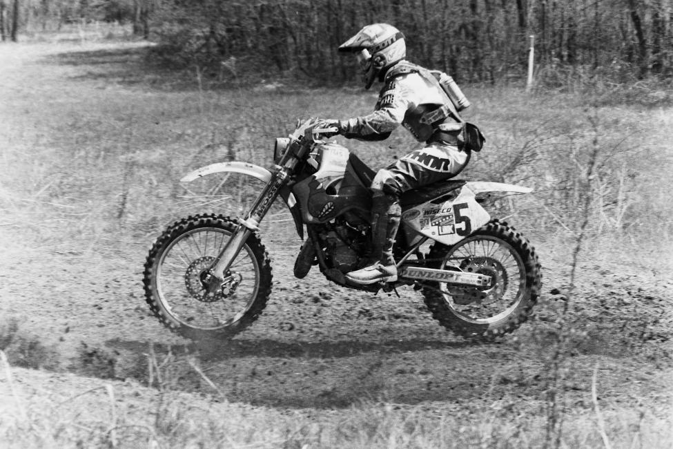 No that's not a real Ninja Turtle. That's the legendary Tommy Norton aboard his Team Mirage backed KX125. Norton gained fame as the first rider to win the Blackwater 100 aboard a 125, and did so as a relatively unknown rider at the time. A few years later he picked up the Team Mirage ride backed by the Tennage Mutant Ninja Turtles. The Blackwater win may have been Norton's only GNCC overall win, but it's undoubtedly one of the most famous wins in the history of the sport