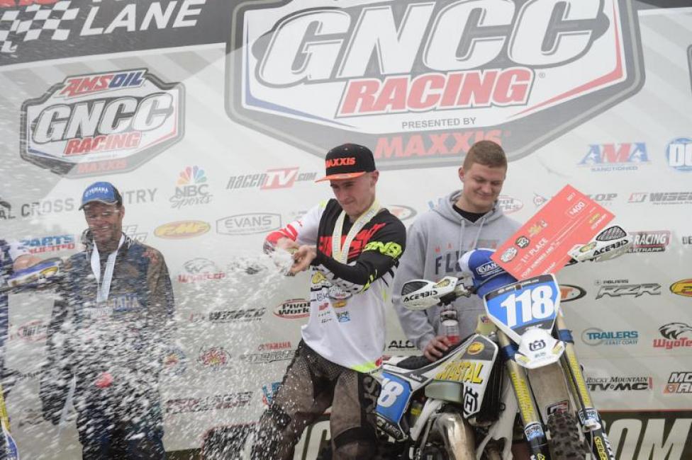 Edmondson celebrates another win atop the XC3 podium.
