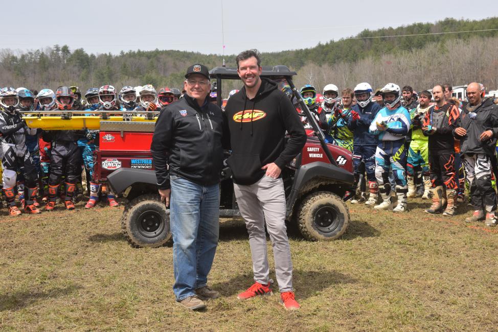 Racer Productions Director, Tim Cotter and Kurt Caselli Foundation President, Donny Emler Jr. with the new safety vehicle with pro riders at the FMF Steele Creek GNCC.