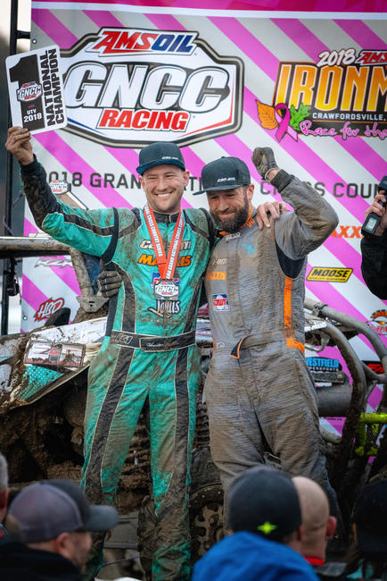 Can-Am pilot Hunter Miller and co-pilot Adam McGill celebrate Miller's 2018 GNCC XC1 Pro Turbo UTV championship on the Ironman GNCC podium in Indiana.