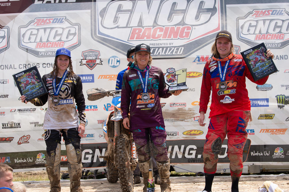 Becca Sheets (center), Mackenzie Tricker (right) and Rachael Archer (left) claimed the top three spots in the WXC class at the High Voltage GNCC.