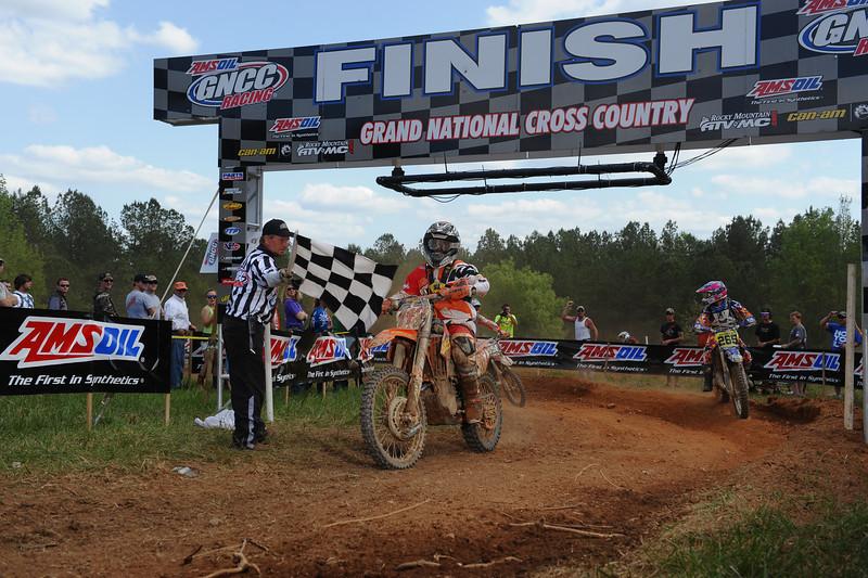 Mullins' victory gives him the points lead after four rounds of racing 