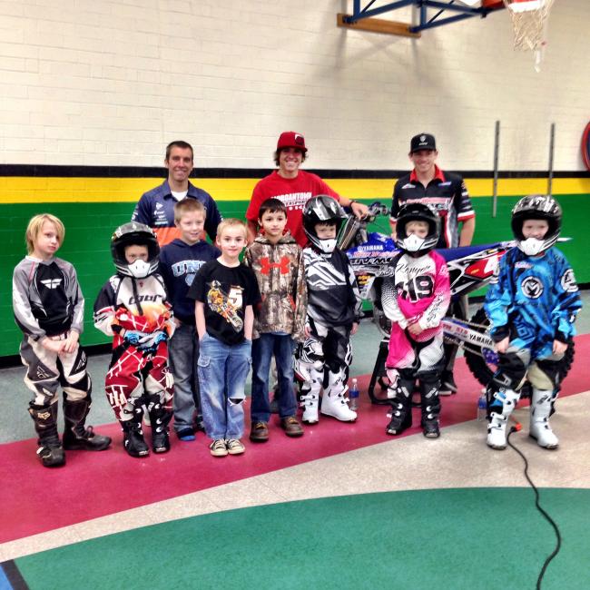 In the back, Charlie Mullins, Layne Michael and Josh Strang played a game with the students to teach them how safety gear works 