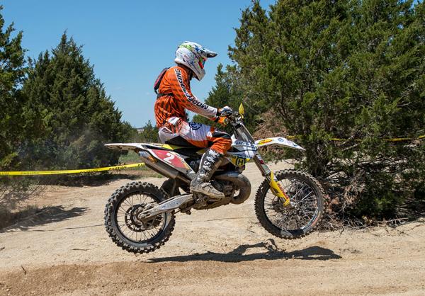 Fahringer put hte Superstore Moto 9 Bell Helmet on the podium