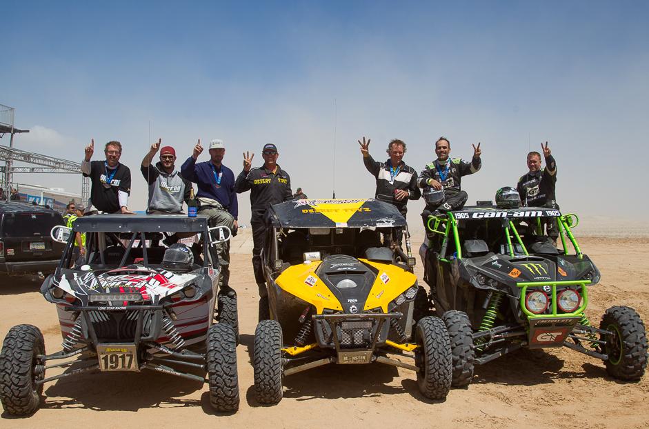 (From left) Can-Am Maverick 1000R side-by-side racing teams Murray Racing / Can-Am / ITP (first), Desert Toyz / Can-Am (third) and MB Motorsports / Can-Am (second) all made the SCORE International IV 250 Class 19 podium in Plaster City, Calif.
