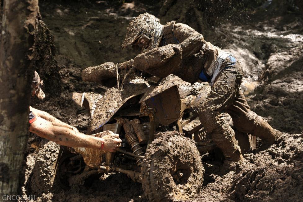 A very challenging mud hole for the afternoon ATV race had a lot of spectators helping pull out stuck ATVs