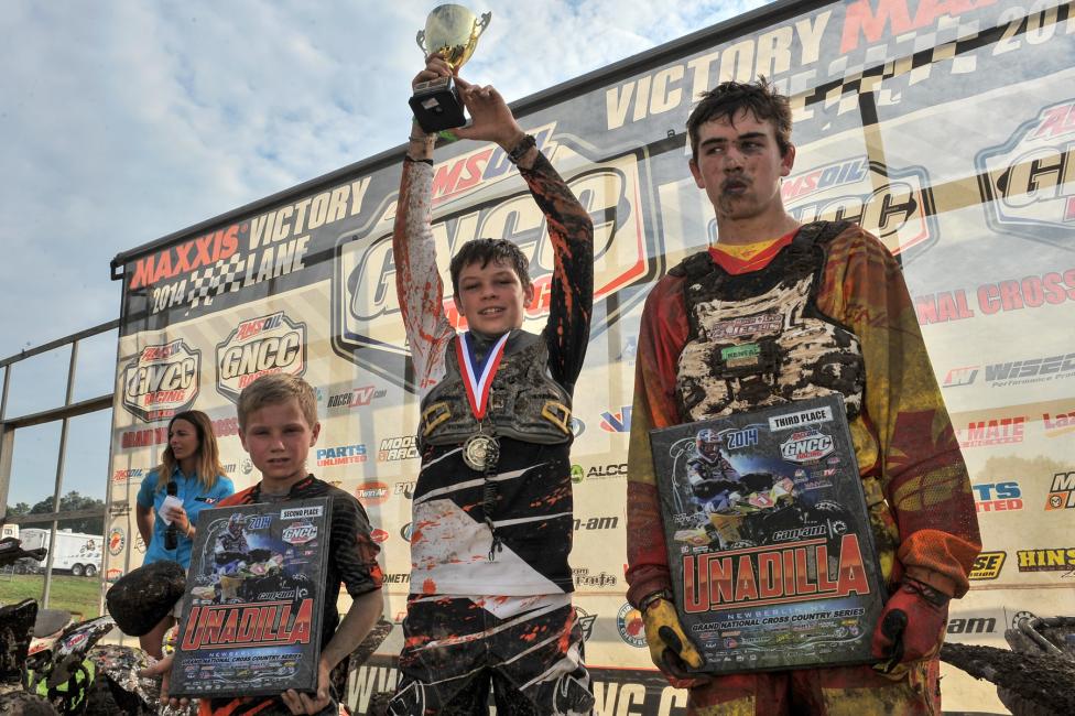 Youth overall podium: (left) Tim Sroka, Brandon Frazier, (right) Jordan Purvis. 