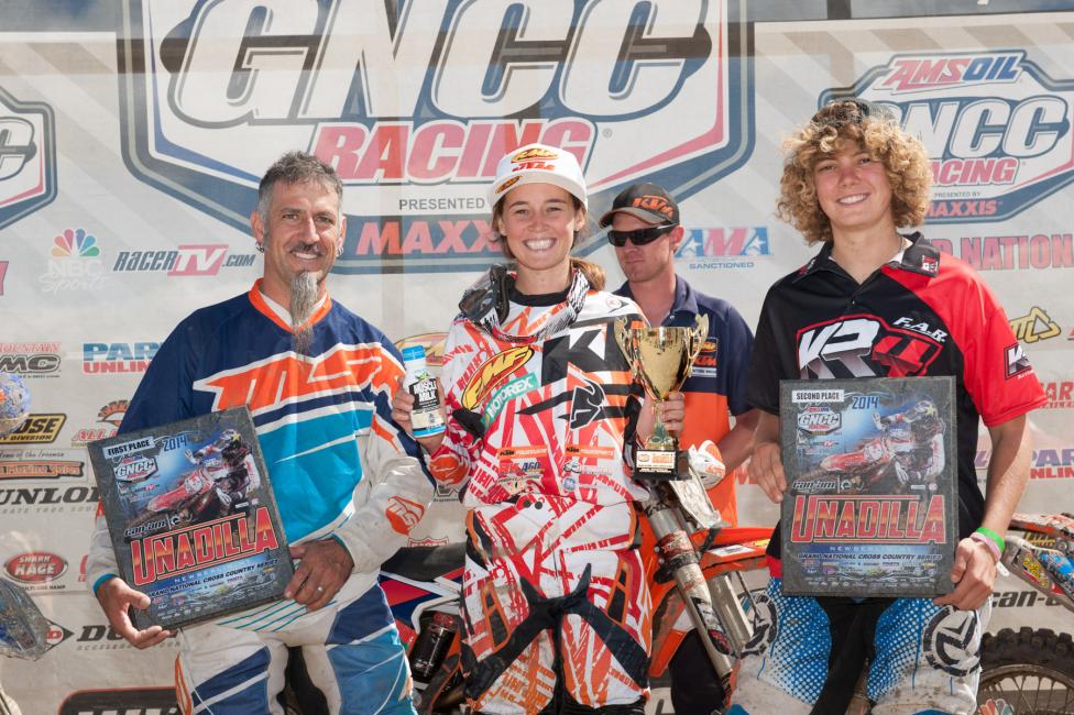 10 AM overall podium: (left) Paul Goyette, Kacy Martinez, (right) Sarah Baldwin 