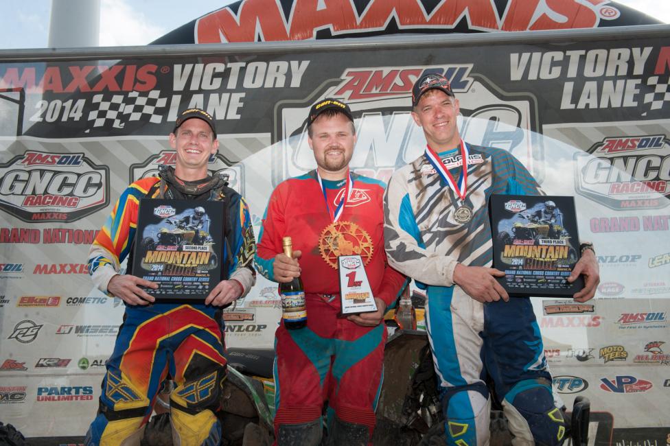 10 a.m. podium: (left) Bryan Buckhannon, Rob Smith, (right) Michael Swift 