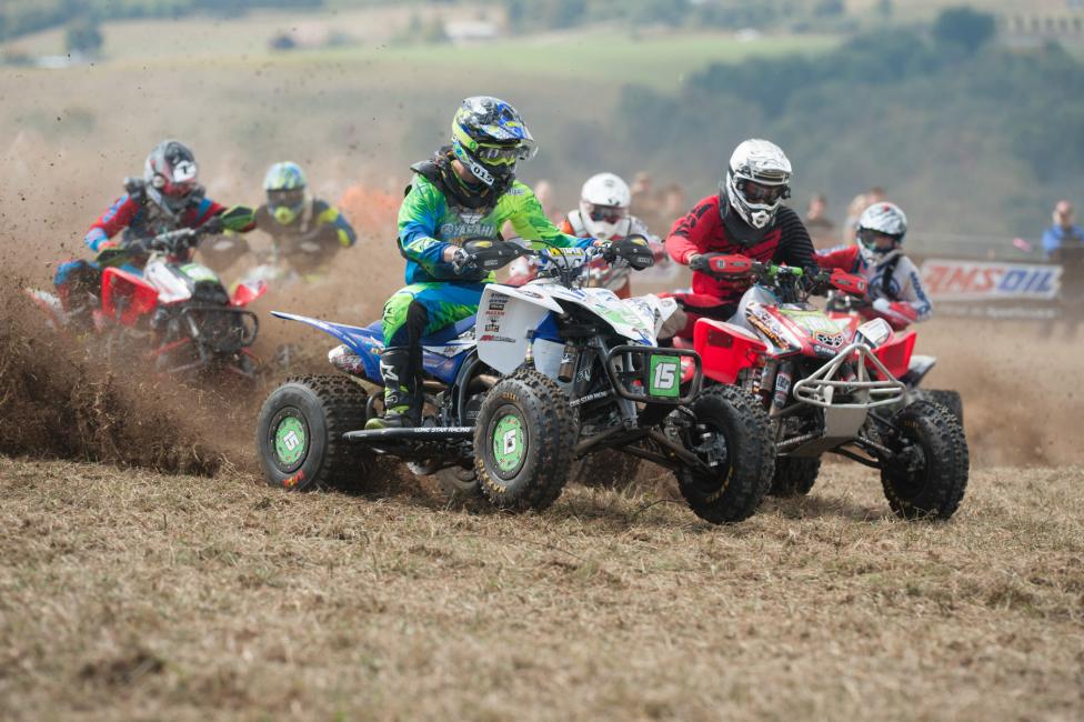 Cole Richardson (15) and Marshal Goings (right) have a tight battle going in XC2