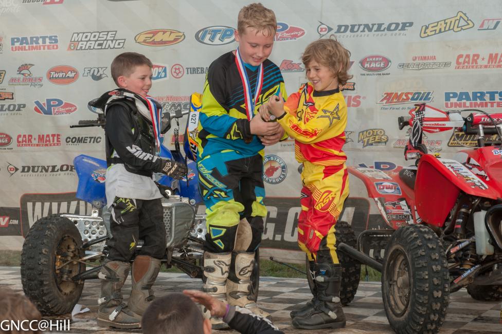 Will Best (center) captured the final Micro 50cc ATV win but little Kaden Lambruno (right) emerged as the 2014 Champ. And Wyatt (left) managed to make it ALL SEASON without saying one word on the podium! There's always 2015 bud, we'll get ya!