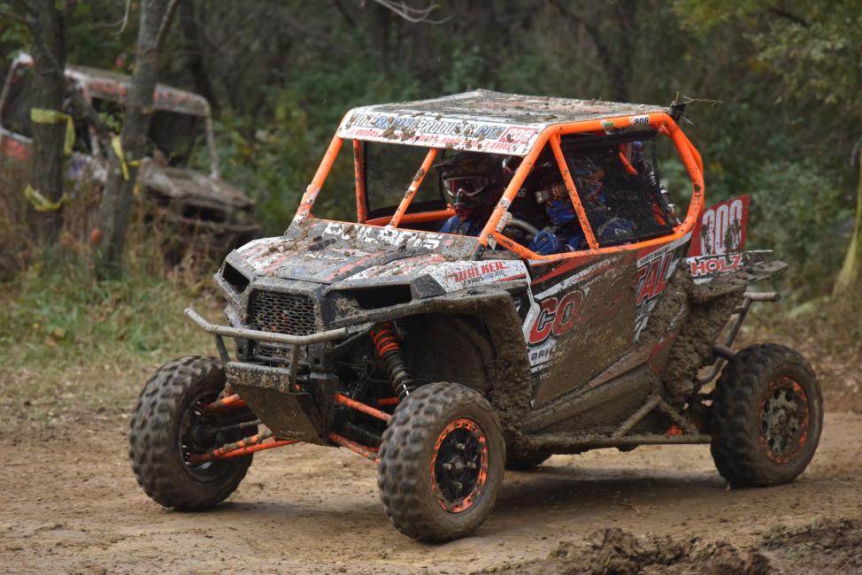 Scott Kiger held off John Yokley's machine for the first half of lap one at Powerline Park this past weekend.