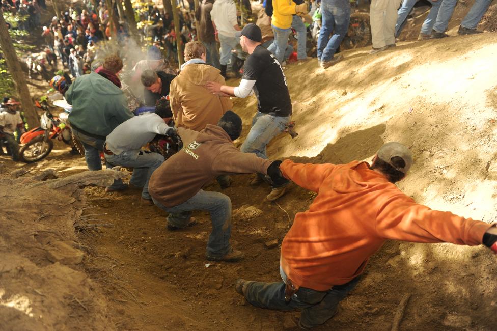 Ironman Spectators help riders up the infamous hill climb by building human chains