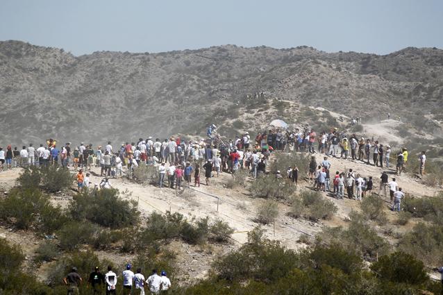 Specators and crew watch one of the enduro tests in day four