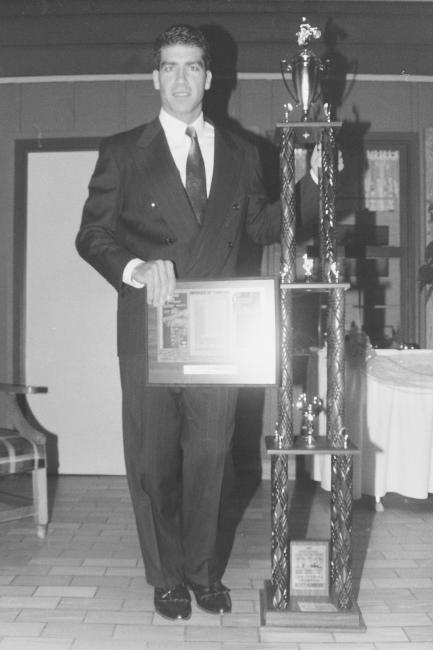 In the spirit of this weekend's banquets, here's one I came across of Scott Summers with his 1996 championship trophy