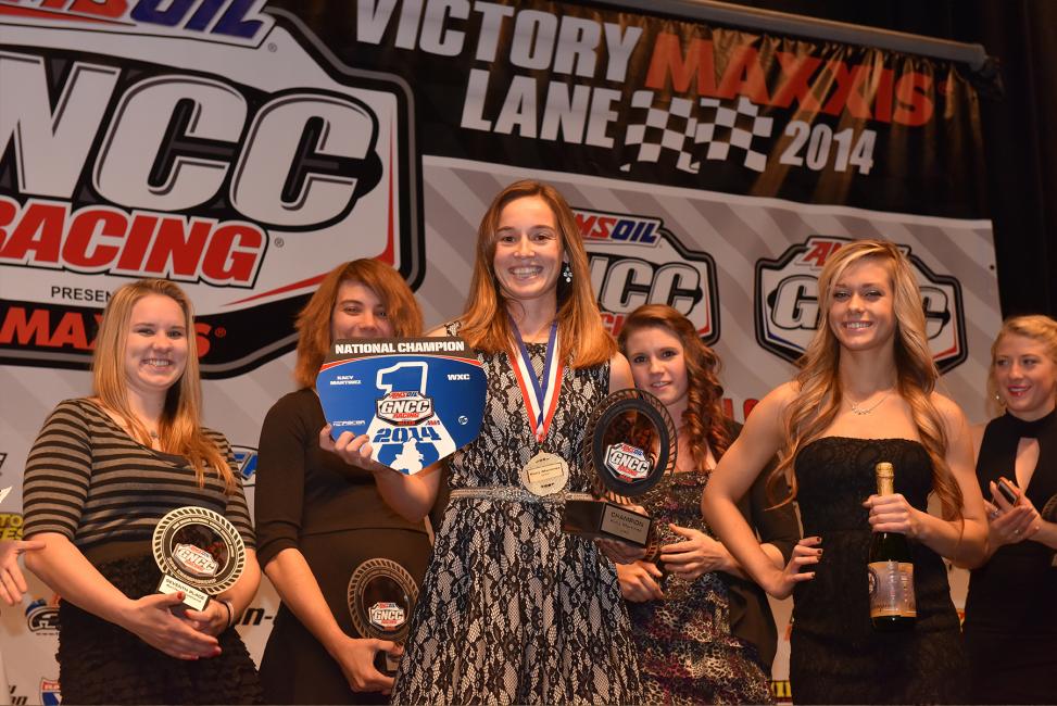 Kacy Martinez at the GNCC banquet accepting her number 1 plate in the WXC class