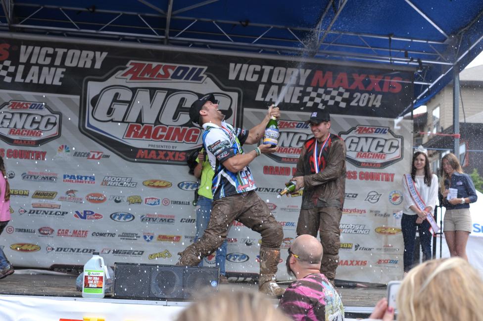 Adam McGill hopes to have more moments in 2015 like he did in this one at Snowshoe last year when he was on the top spot of the podium!  Photo: Ken Hill