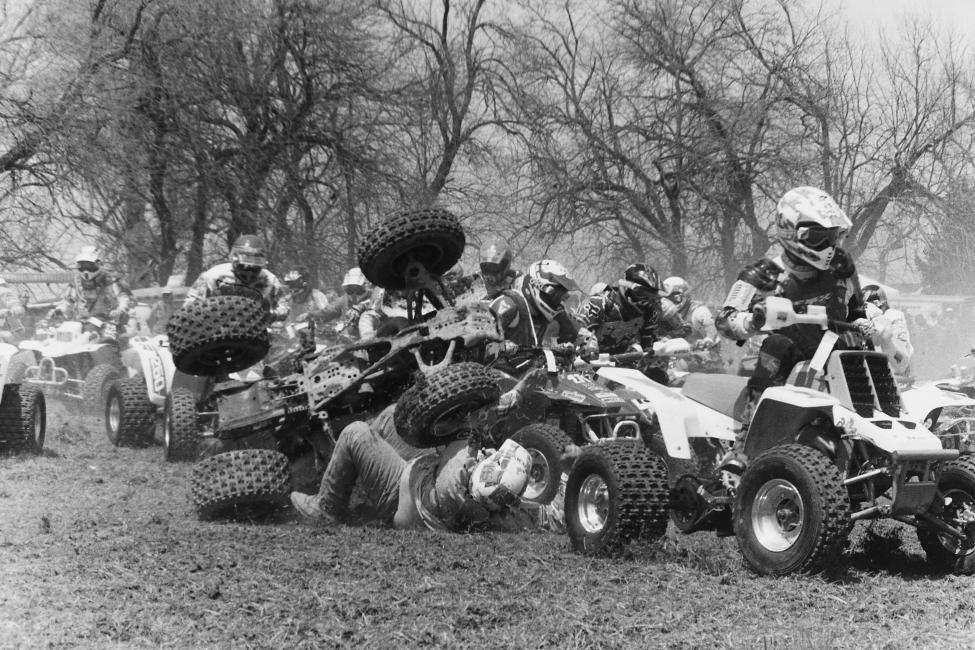 Barry Hawk pointed out this photo a while back, not only is it a good crash photo but also the guy on the ground is our buddy Ronnie Paul Wilson from the New East Coast XC series, and also lends a hand in the woods on Saturdays at GNCC events.