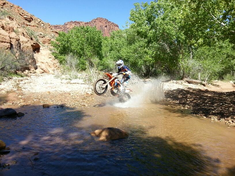 Mike Tetlow Jr splashes his way through a creek crossing....
