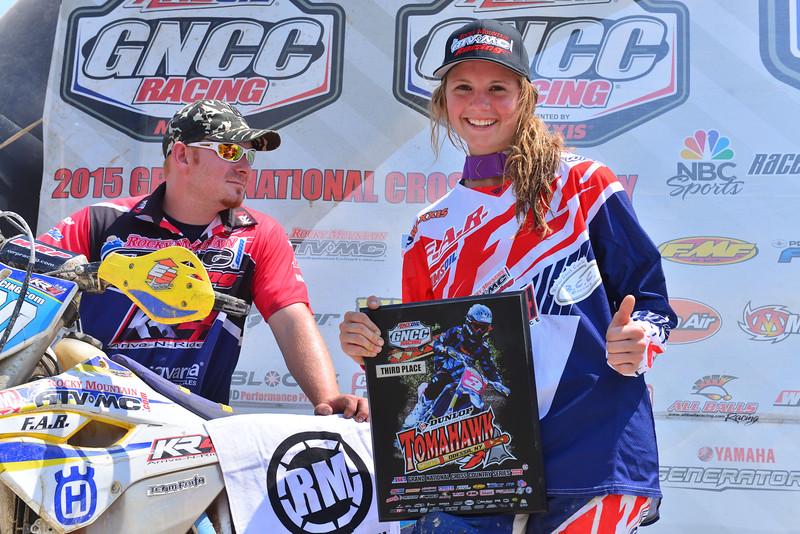 Brooke Cosner is all smiles after a podium apperance in the WXC class