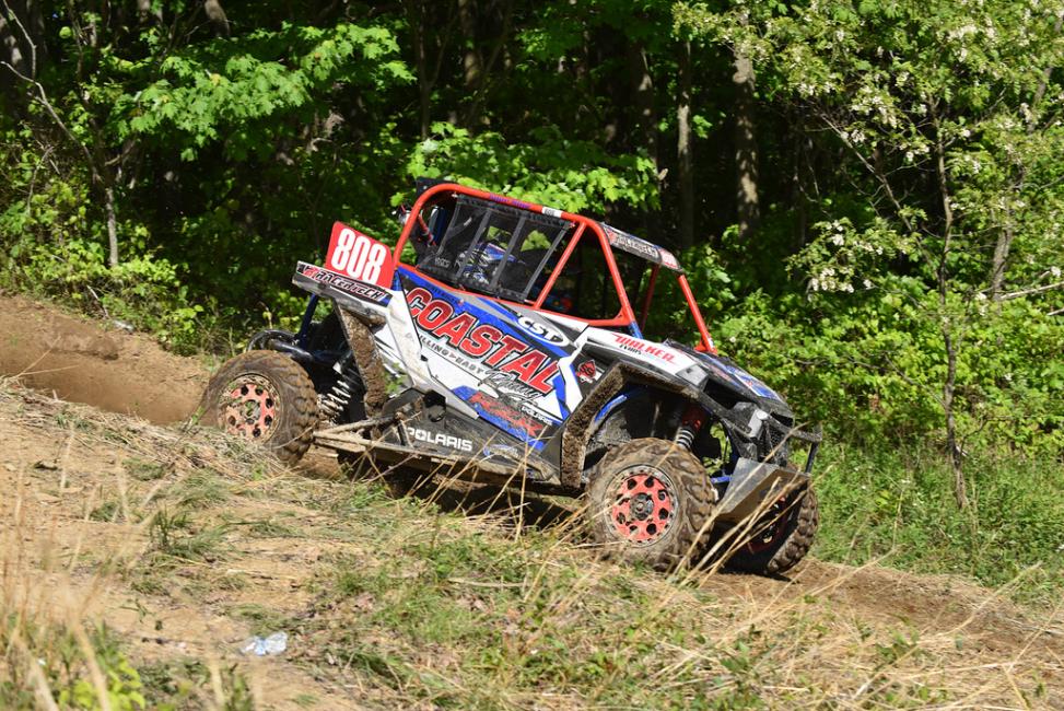 Scott Kiger and passenger, Tyler King, captured the holeshot as they took off from the third row