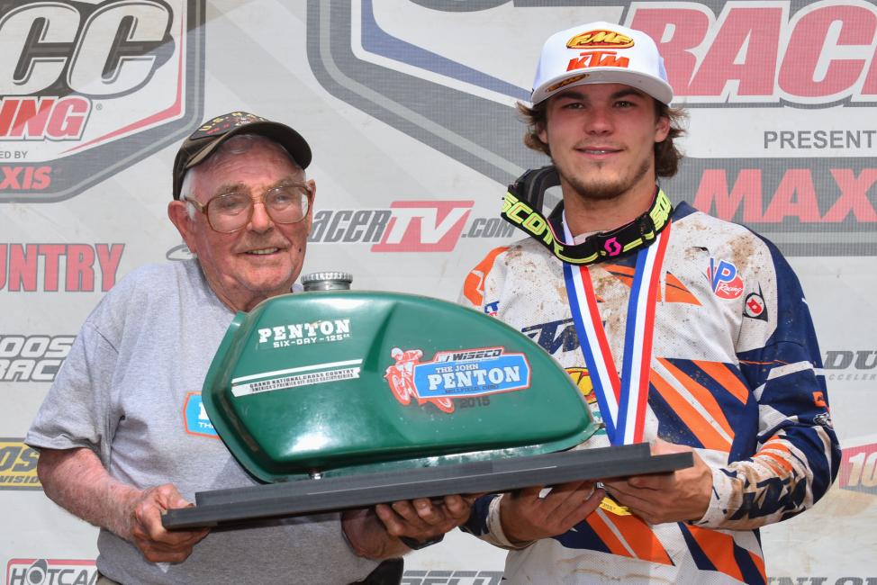 John Penton was on-site to personally present one of the best trophies ever, an original Penton Motorcycle gas tank, to Russell after his win.Photo: Ken Hill