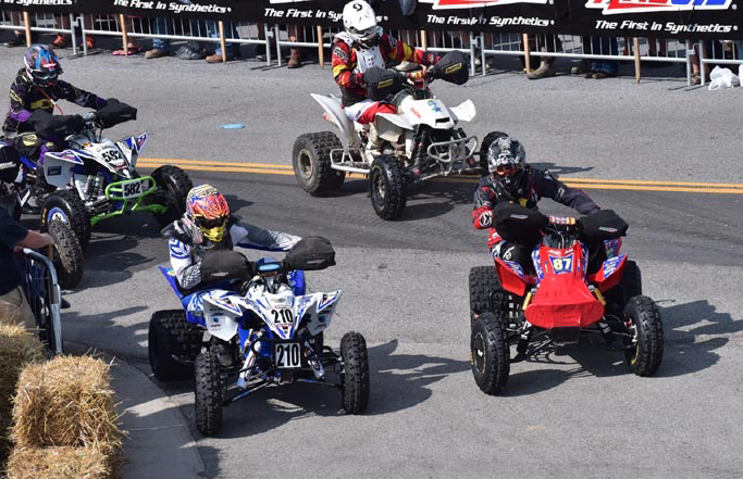 Dave Simmons (No. 210), seen here pulling the holeshot in West Virginia, won his ninth straight Super Senior ((45+) class race of the 2015 to record his fouth consecutive Super Senior class GNCC championship for Team ITP.