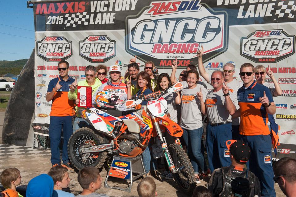Russell celebrates his third title win with the Factory FMF KTM team, friends and family.