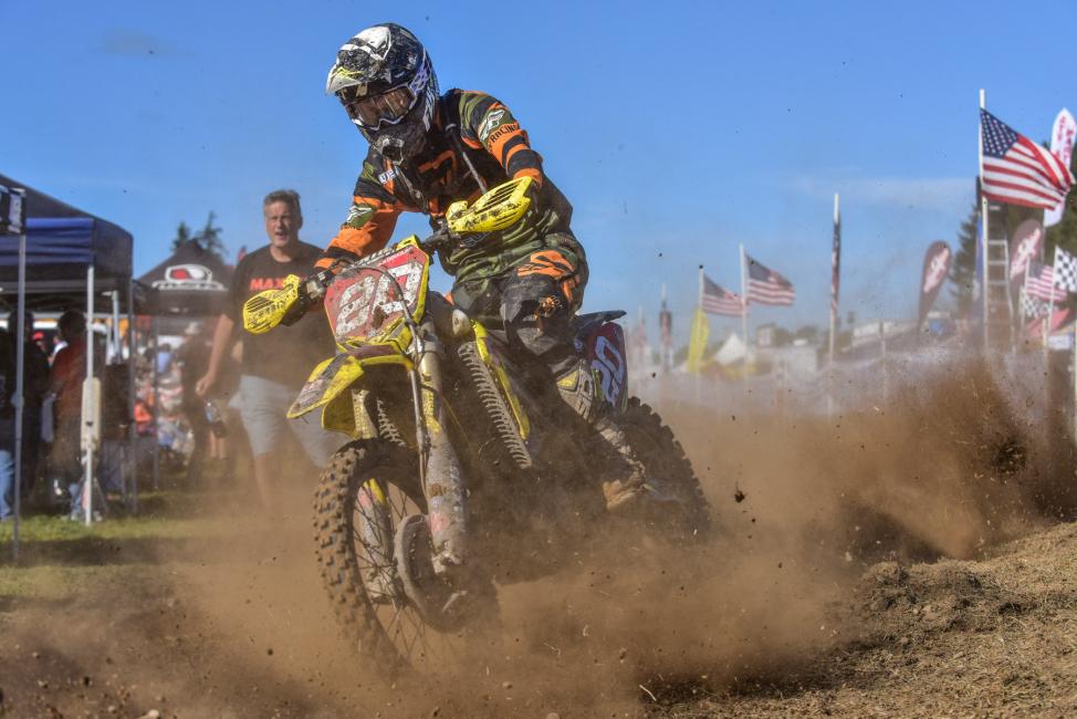 Chris' dad, Jim (in the background) helped to get Chris started racing!