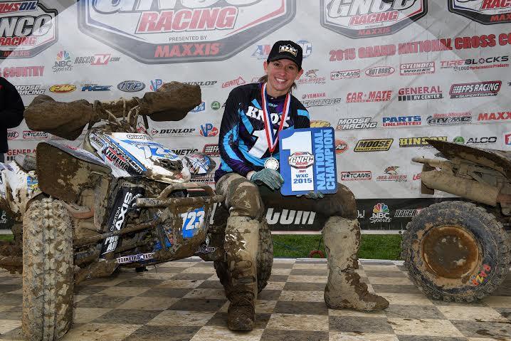 Angel pictured with her second consecutive WXC title, third title in all. 