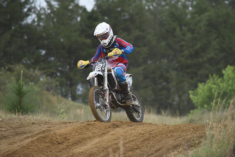 Dylan Brinson takes advantage of the open track during the morning's Youth race. Photo: Ken Hill