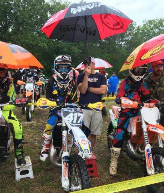 Cole Groover stays dry before taking off in the morning race.