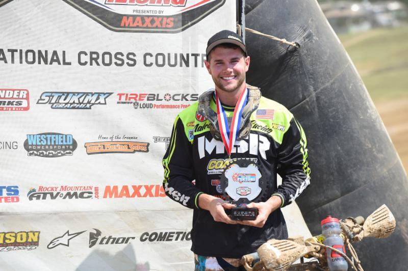 Neal is all smiles on the XC1 Pro podium. Photo: Ken Hill
