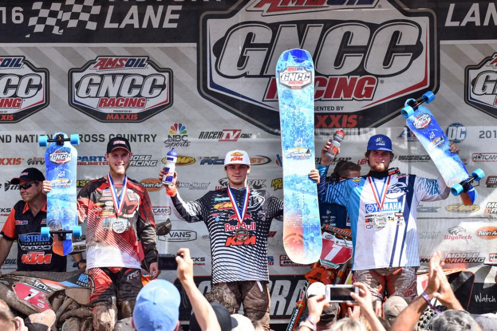 Kailub Russell (center), Grant Baylor (right) and Jordan Ashburn (left) rounded out the top three in the XC1 Pro class at the AMSOIL Snowshoe GNCC.