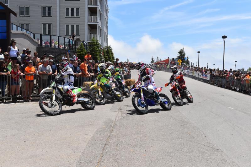 Craig DeLong (left) grabs the holeshot aboard his TC250. Photo: Ken Hill