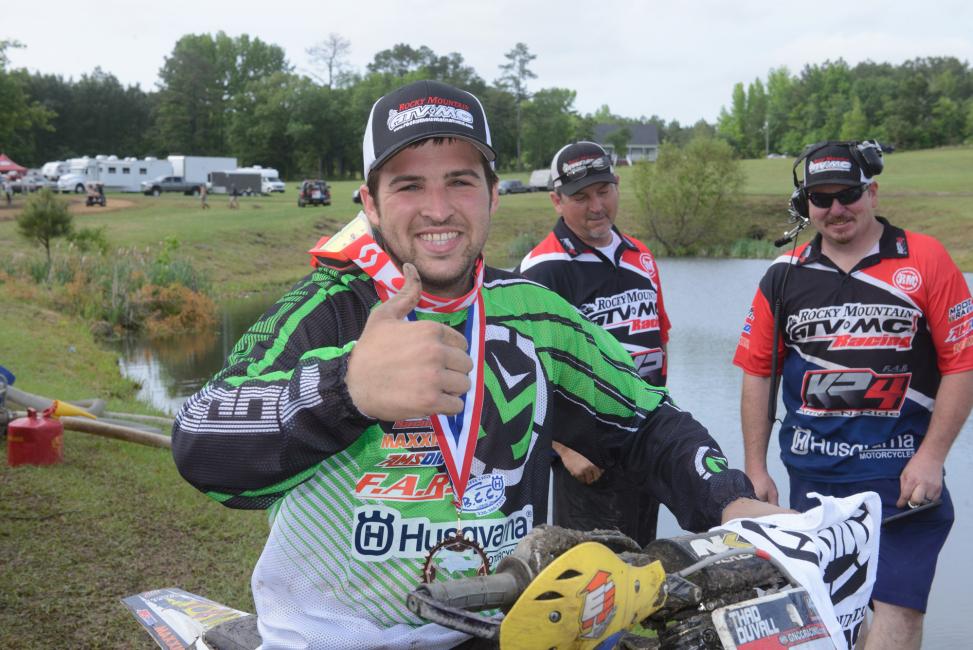 These days you can find Chad (background on left) hanging around the KR4 pits helping to make sure Thad's race weekend's go as smoothly as possible