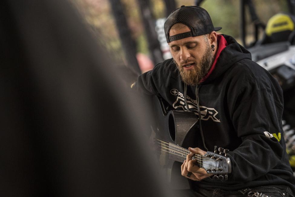 Brantley Gilbert played a few songs for the families after their day of riding.