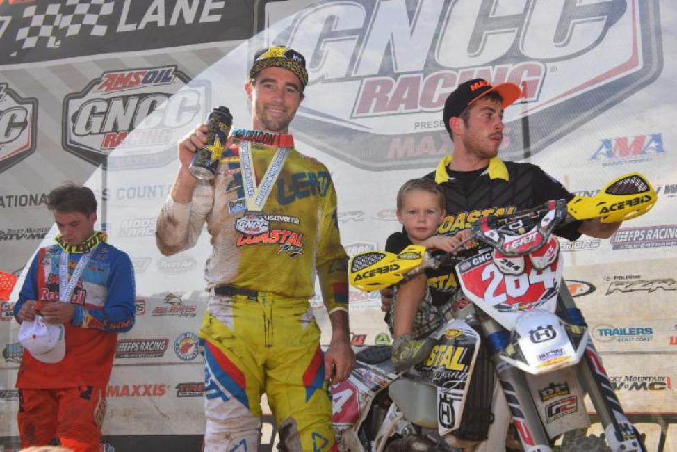 Ryan Sipes is all smiles in the center of the podium