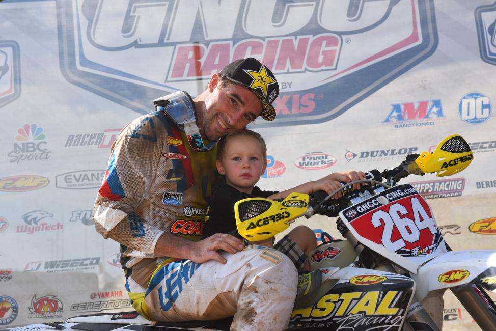 Ryan was all smiles while he shared the podium and win with his son, Jack.