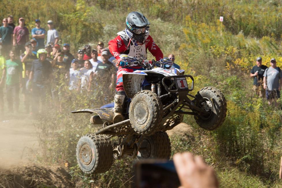 Walker Fowler launches the famous creek jump on his way to his 11th win of the season.