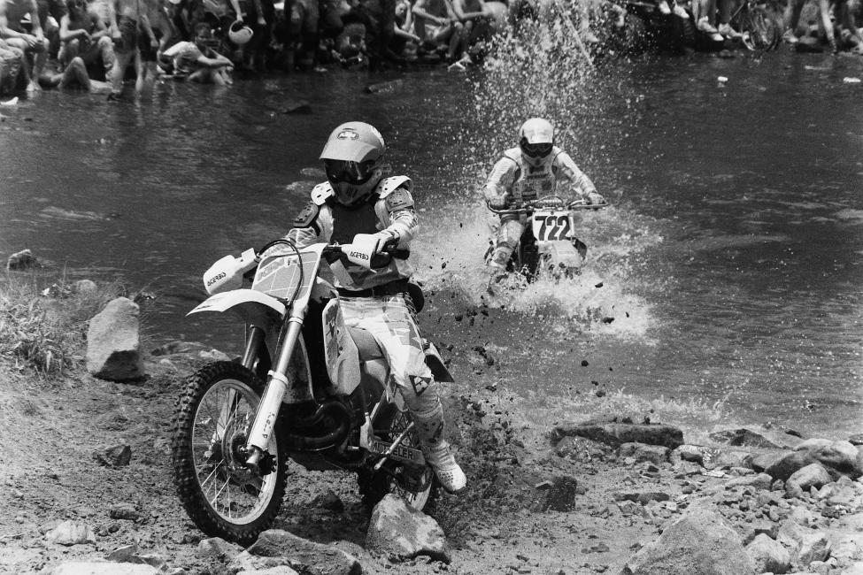 Let's back up to the 1991 Blackwater 100 GNCC. That's former KTM USA President, Rod Bush, leading Indiana's Kurt Hough through the first river crossing.