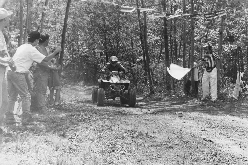 Taking the white flag during a 1996 GNCC ATV race.