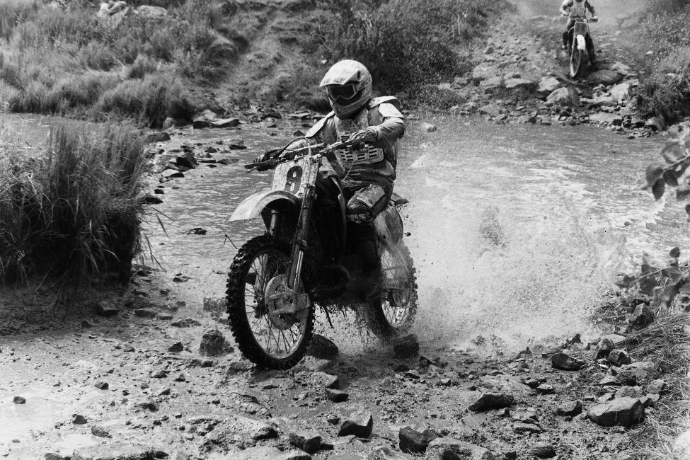 Duane Conner splashes out of one of the river crossings at the 1991 Blackwater 100.