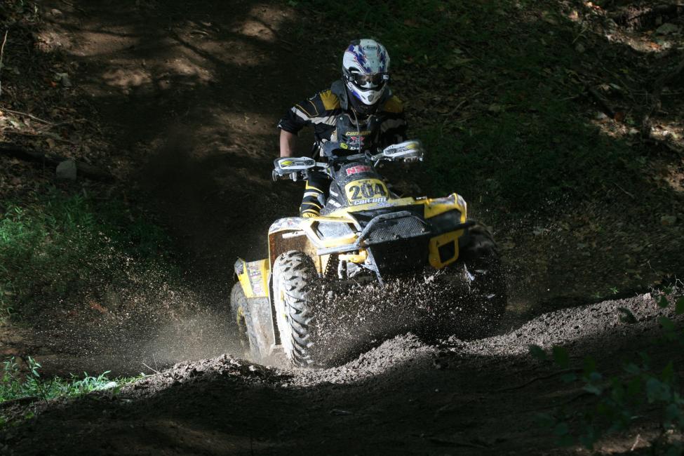 Michael Swift works his way through the woods of the 2010 Titan GNCC.
