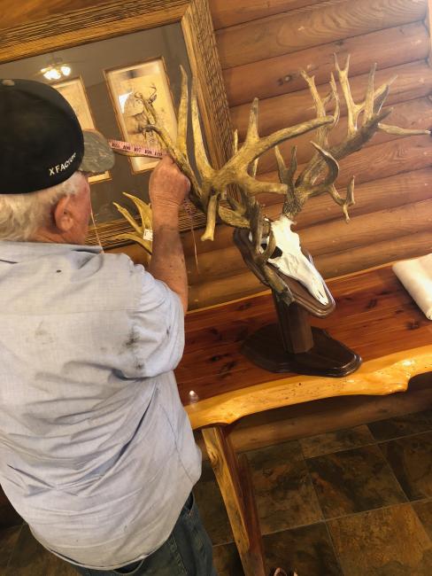 X-Factor Whitetails' own Russ Bellar scores this year's overall trophies. These real racks which scored at 360 and 325, were harvested right on property of this weekends race.