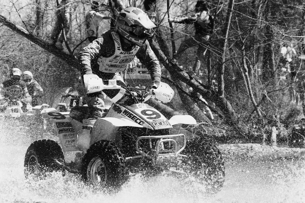 These days you can find Mike Holbert ripping around on one of the RacerTV KTMs, filming the action for the NBCSN broadcasts but Mike was once a top ATV pilot. Here's a photo of Mike from 1991.