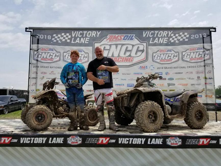 Rick Valentine shares the podium with his son Tyler Valentine.