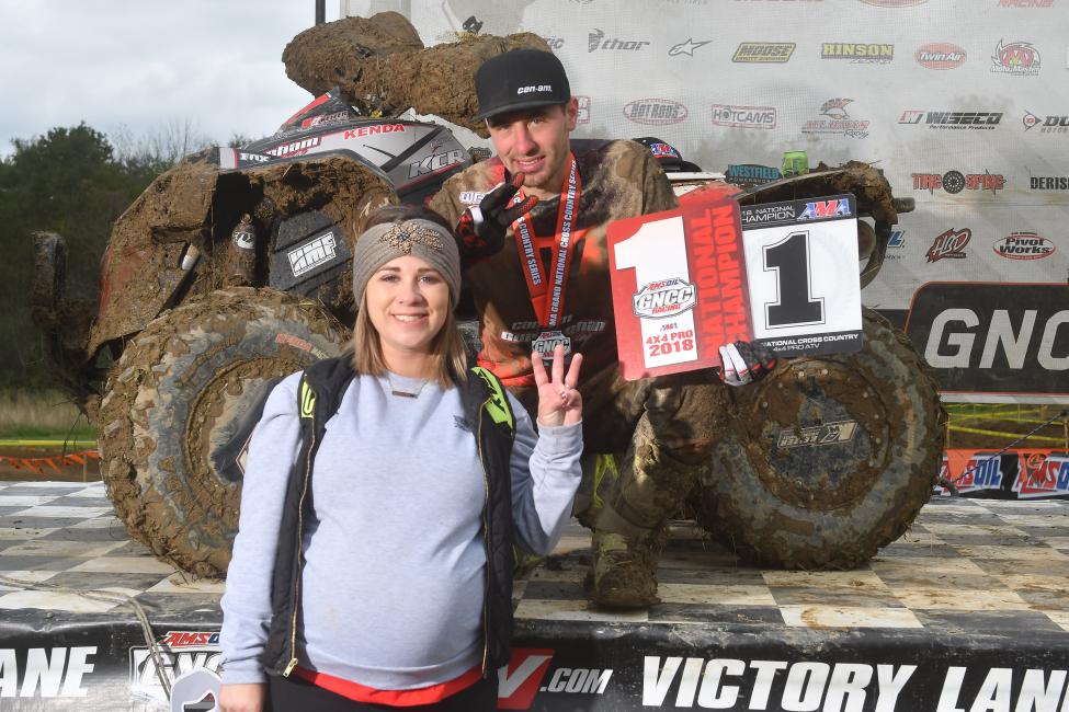 Kevin Cunningham and wife Samantha together on the podium celebrating championship No. 3. 