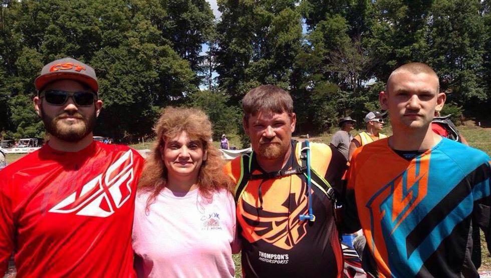 Catherine Cook with her son Jonathan Jr, husband Jonathan and son Daniel at a race.
